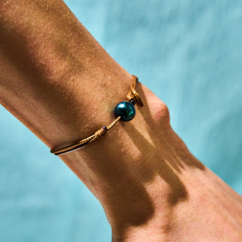 Pulsera curativa con cuerda de cera y cuentas de perla negra de Tahití naturales y Buddha Stones