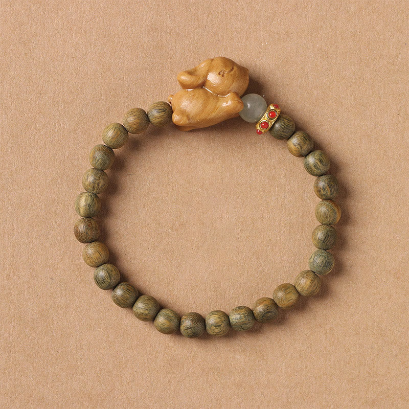 Pulsera positiva con forma de conejo y sándalo verde y dorado con Buddha Stones