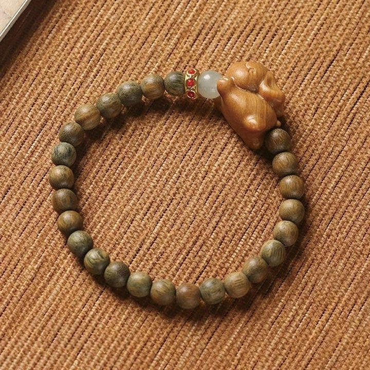 Pulsera positiva con forma de conejo y sándalo verde y dorado con Buddha Stones