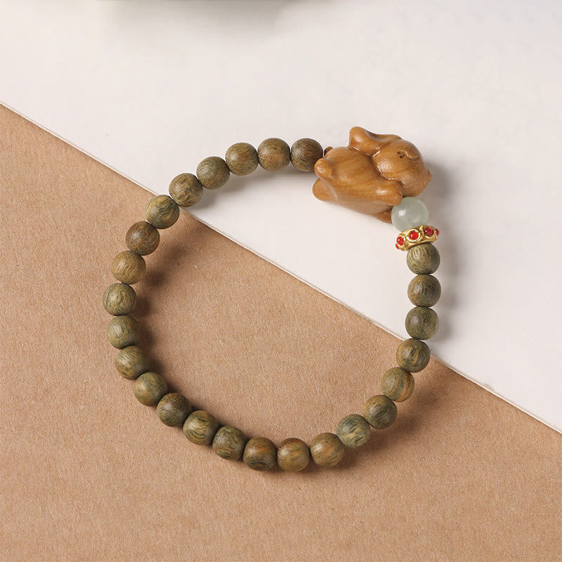 Pulsera positiva con forma de conejo y sándalo verde y dorado con Buddha Stones