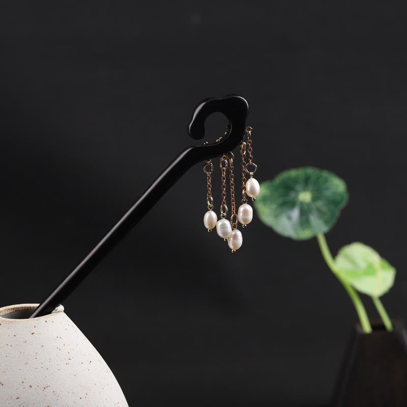 Horquilla protectora con borla de perla de nube auspiciosa de ébano y Buddha Stones