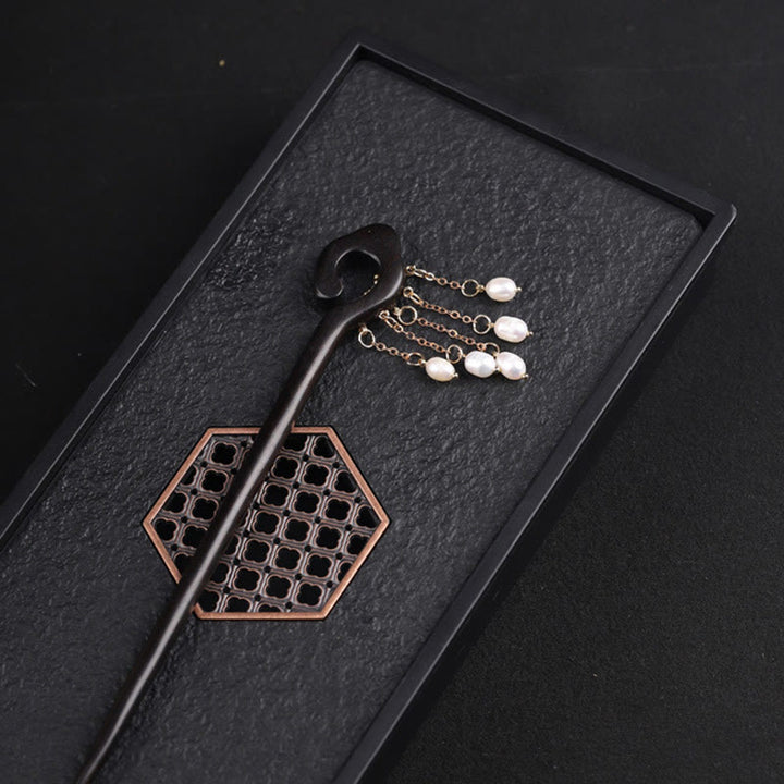 Horquilla protectora con borla de perla de nube auspiciosa de ébano y Buddha Stones