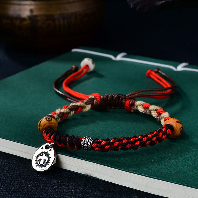 Pulsera de la suerte con hilo de Garuda tibetano tejido a mano con Buddha Stones