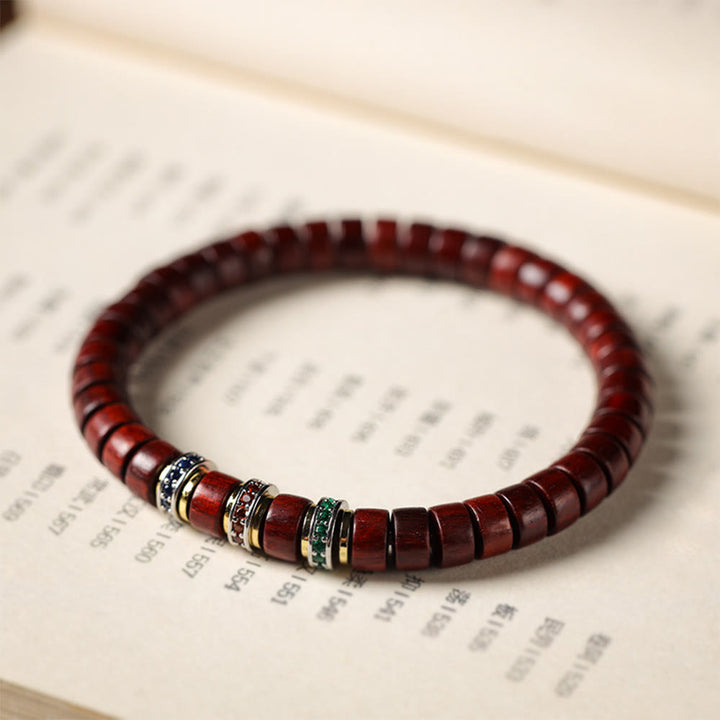 Pulsera de la paz con Buddha Stones, madera de ébano y sándalo rojo con hojas pequeñas y circonitas