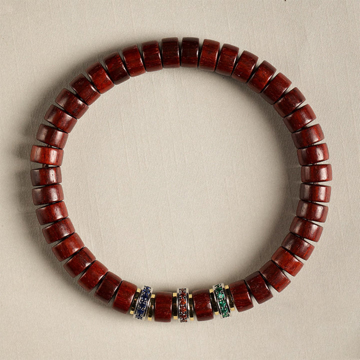 Pulsera de la paz con Buddha Stones, madera de ébano y sándalo rojo con hojas pequeñas y circonitas