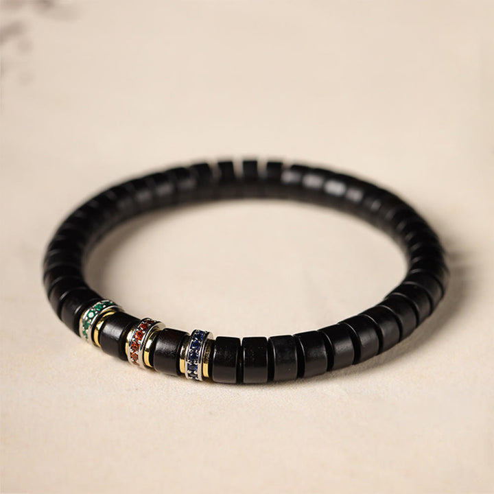 Pulsera de la paz con Buddha Stones, madera de ébano y sándalo rojo con hojas pequeñas y circonitas