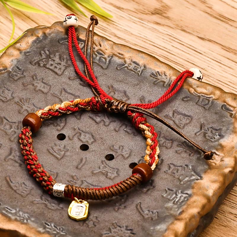 Pulsera trenzada de madera con protección de la diosa de la riqueza tibetana Zakiram hecha a mano con Buddha Stones