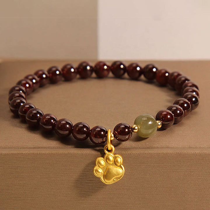 Pulsera purificadora de cuentas de jade hetian con granate y pata de gato de Buddha Stones