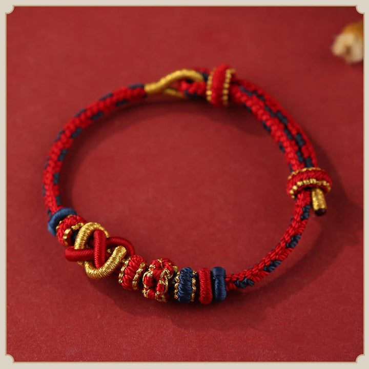 Pulsera ajustable de cuerda colorida con nudo de paz de flor de durazno hecha a mano con Buddha Stones