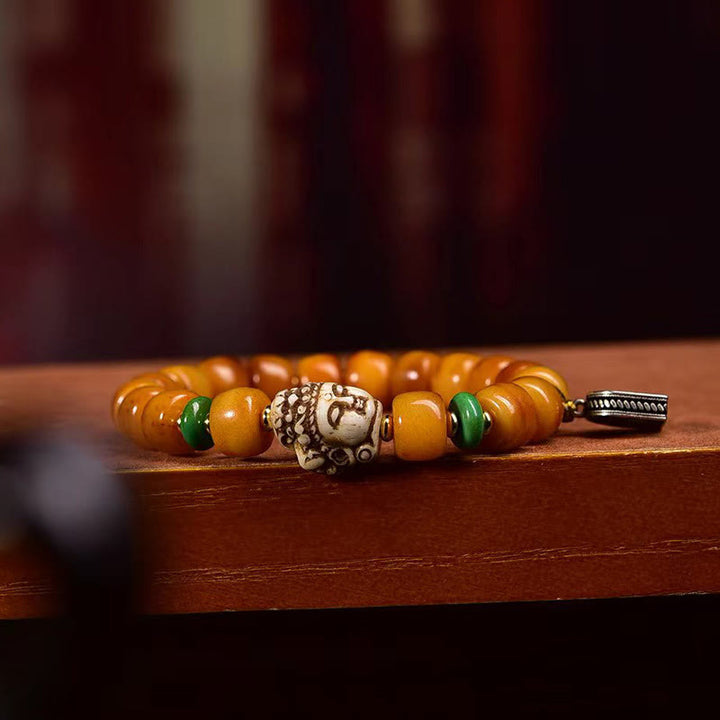 Pulsera de Buddha Stones con cuentas de hueso de camello tibetano natural, cabeza de Buda, protección de la suerte