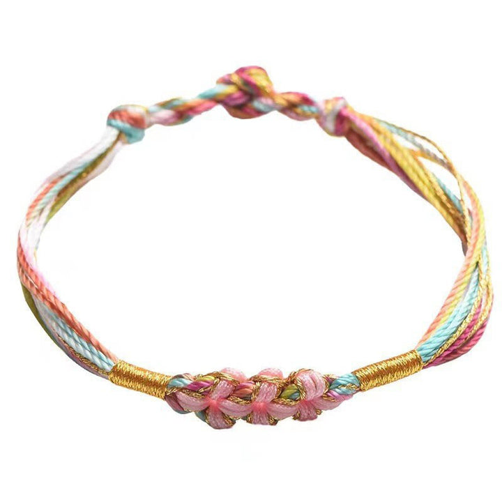 Pulsera trenzada zongzi con nudo de flor de durazno y cuerda colorida de Buddha Stones
