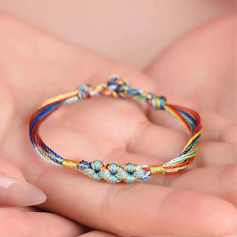 Pulsera trenzada zongzi con nudo de flor de durazno y cuerda colorida de Buddha Stones