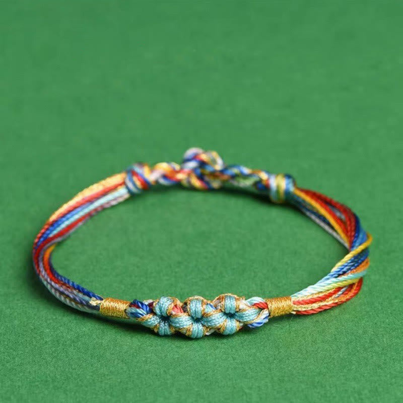 Pulsera trenzada zongzi con nudo de flor de durazno y cuerda colorida de Buddha Stones