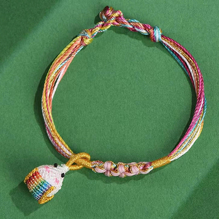 Pulsera trenzada zongzi con nudo de flor de durazno y cuerda colorida de Buddha Stones