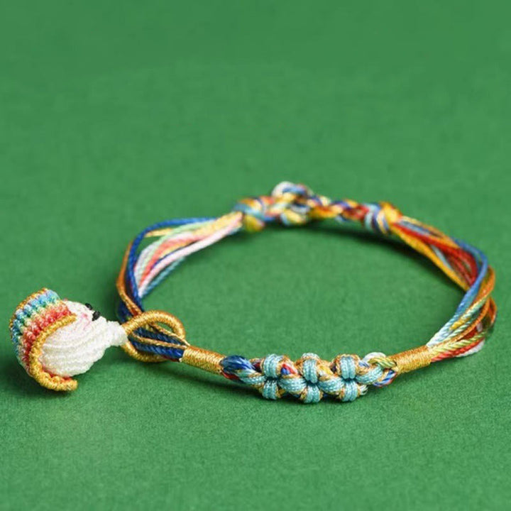 Pulsera trenzada zongzi con nudo de flor de durazno y cuerda colorida de Buddha Stones
