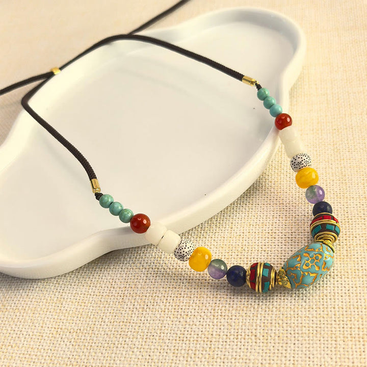 Collar con colgante de equilibrio de cuentas turquesas tibetanas hechas a mano con Buddha Stones