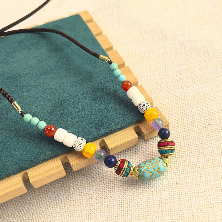 Collar con colgante de equilibrio de cuentas turquesas tibetanas hechas a mano con Buddha Stones