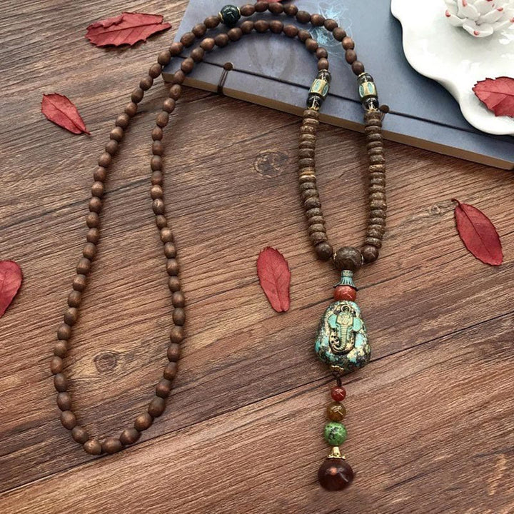 Collar con colgante de cabeza de elefante con cuentas Dzi de madera de wengué tibetana hechas a mano con Buddha Stones