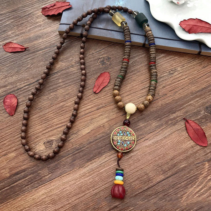Collar con colgante de equilibrio de cuentas de cobre con mantra brillante de madera de Schima, cáscara de coco tibetano, hecho a mano, con Buddha Stones