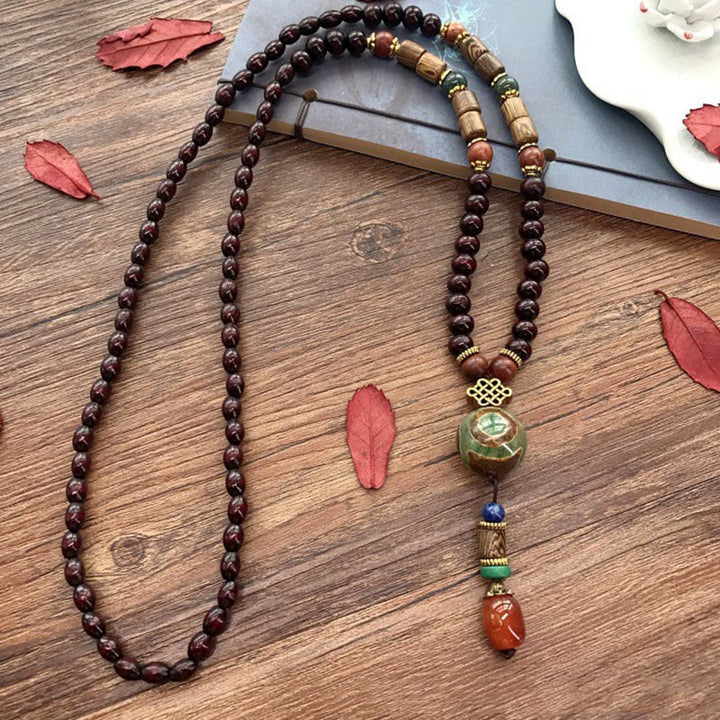 Collar con colgante de cabeza de elefante con cuentas Dzi de madera de wengué tibetana hechas a mano con Buddha Stones
