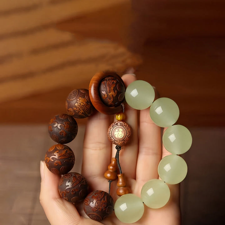 Pulsera de curación con el personaje Pixiu Fu grabado en madera de sappan con Buddha Stones
