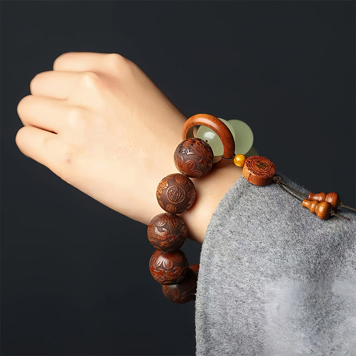 Pulsera de curación con el personaje Pixiu Fu grabado en madera de sappan con Buddha Stones