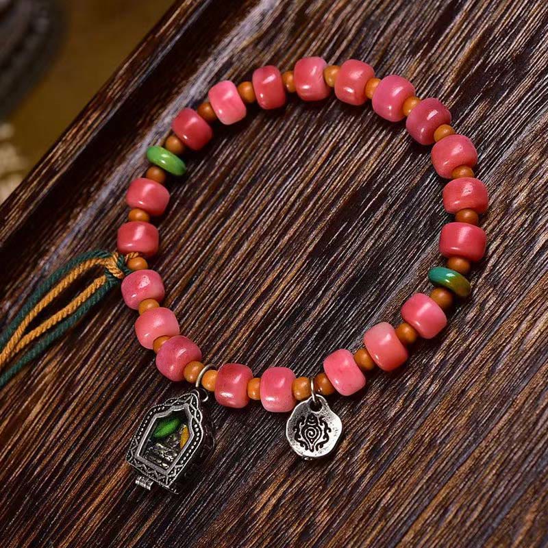 Pulsera de la suerte con Buddha Stones, hueso de camello tibetano, cobre y ágata roja