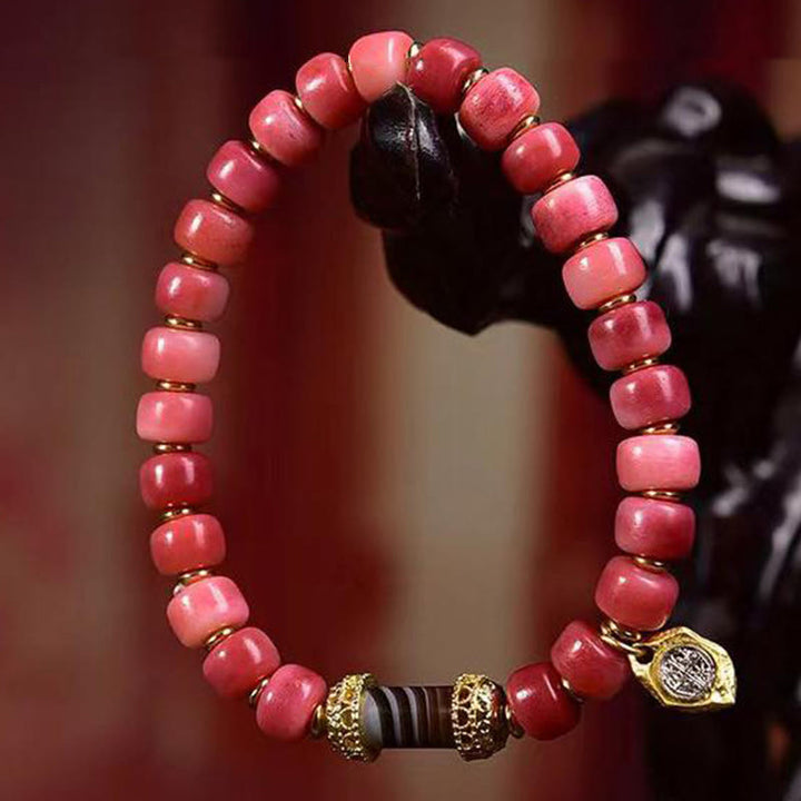 Pulsera de la suerte con Buddha Stones, hueso de camello tibetano, cobre y ágata roja