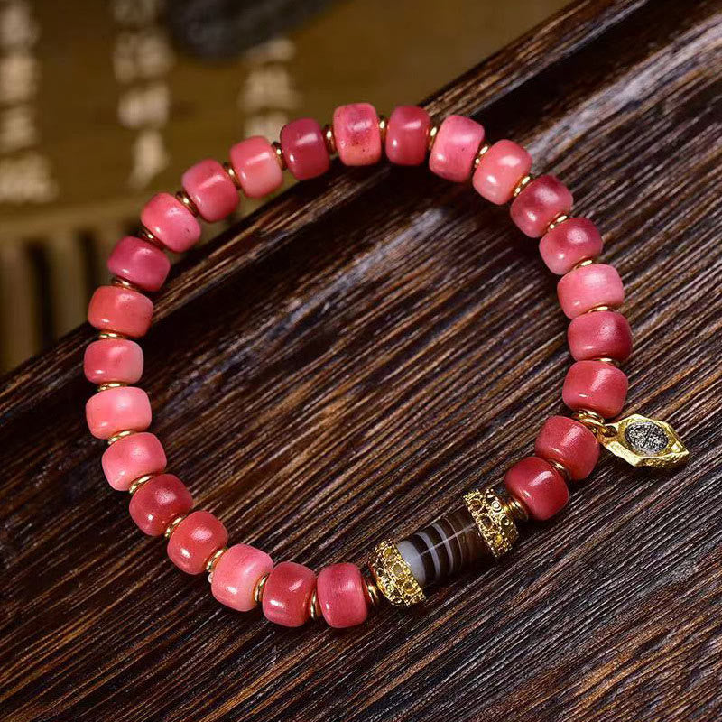 Pulsera de la suerte con Buddha Stones, hueso de camello tibetano, cobre y ágata roja