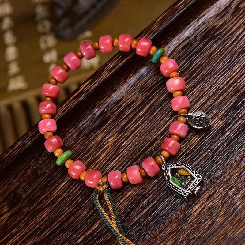 Pulsera de la suerte con Buddha Stones, hueso de camello tibetano, cobre y ágata roja