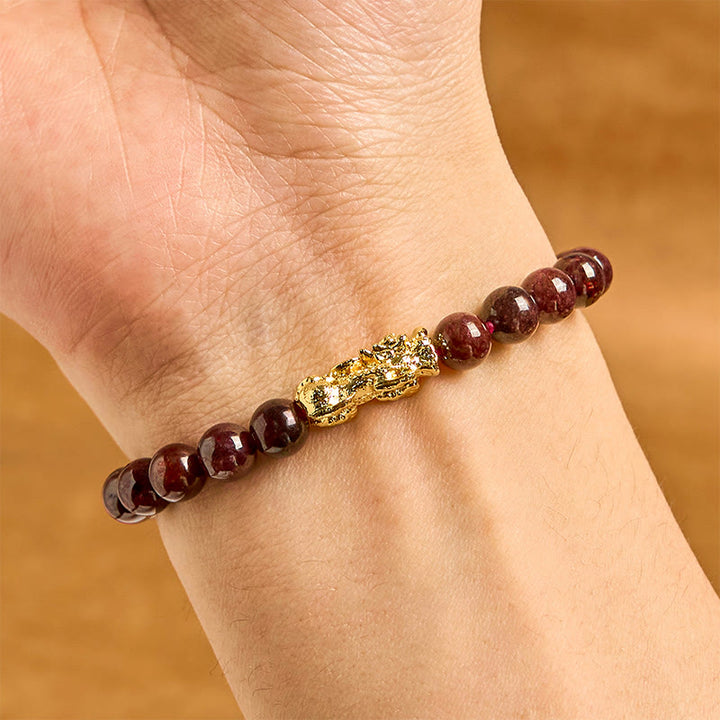 Pulsera de protección PiXiu con cuentas de granate natural y Buddha Stones