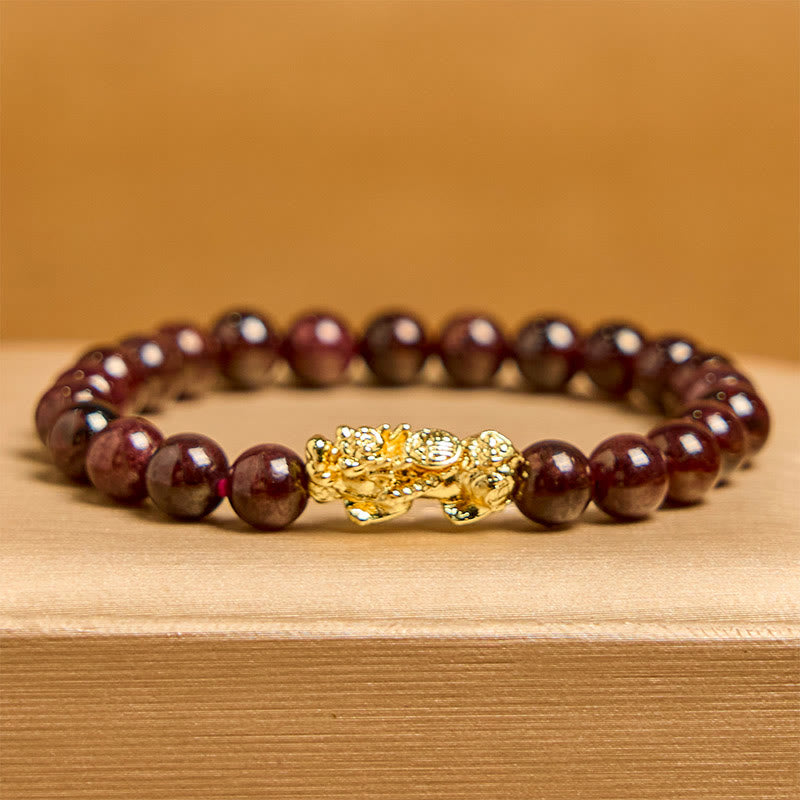 Pulsera de protección PiXiu con cuentas de granate natural y Buddha Stones