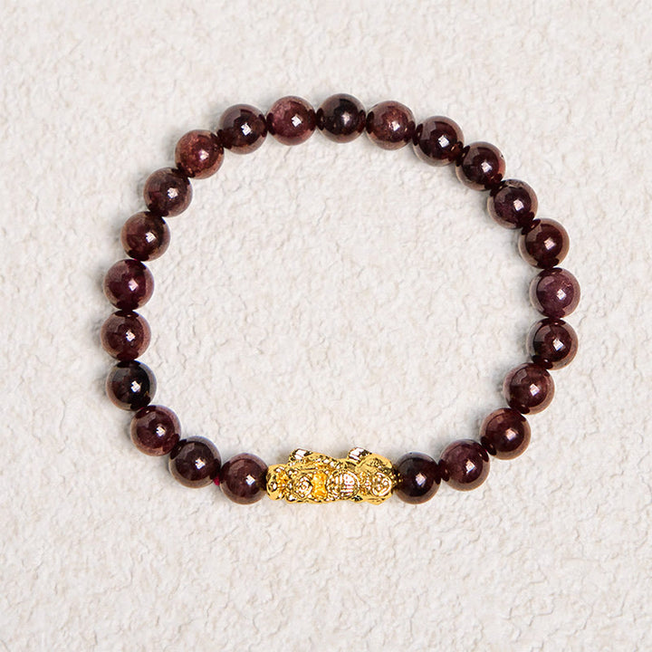 Pulsera de protección PiXiu con cuentas de granate natural y Buddha Stones
