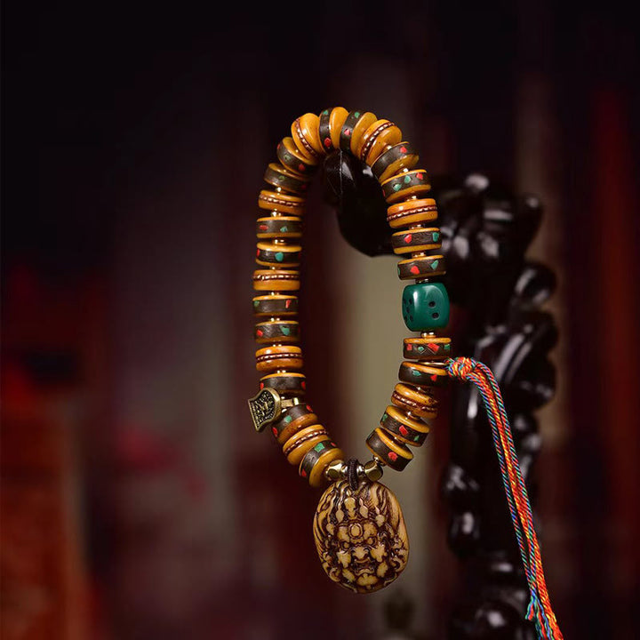 Pulsera de protección con borlas de hueso de camello tibetano y Buddha Stones
