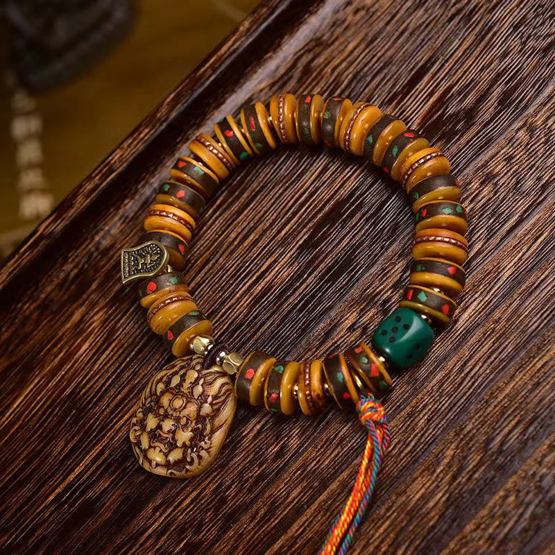Pulsera de protección con borlas de hueso de camello tibetano y Buddha Stones