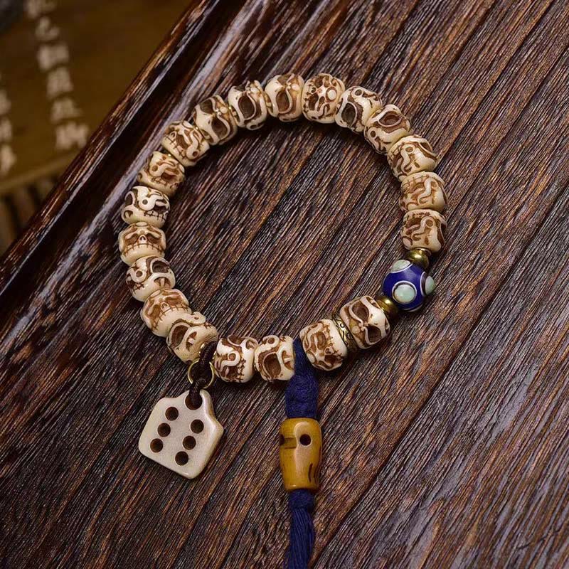 Pulsera de borlas protectoras talladas con garuda de hueso de camello tibetano y Buddha Stones