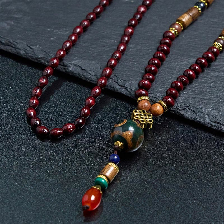Collar con colgante de cabeza de elefante con cuentas Dzi de madera de wengué tibetana hechas a mano con Buddha Stones