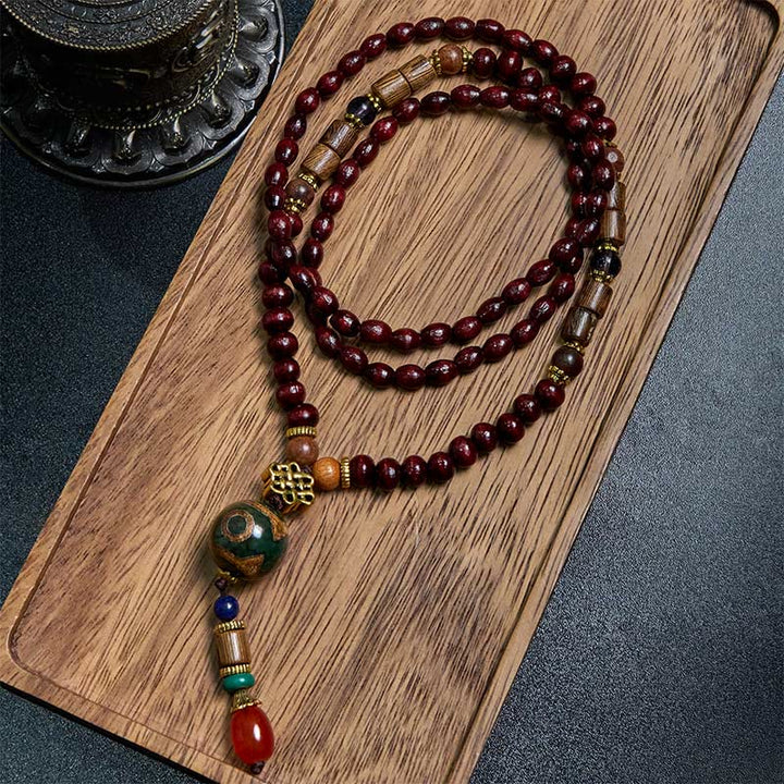 Collar con colgante de cabeza de elefante con cuentas Dzi de madera de wengué tibetana hechas a mano con Buddha Stones