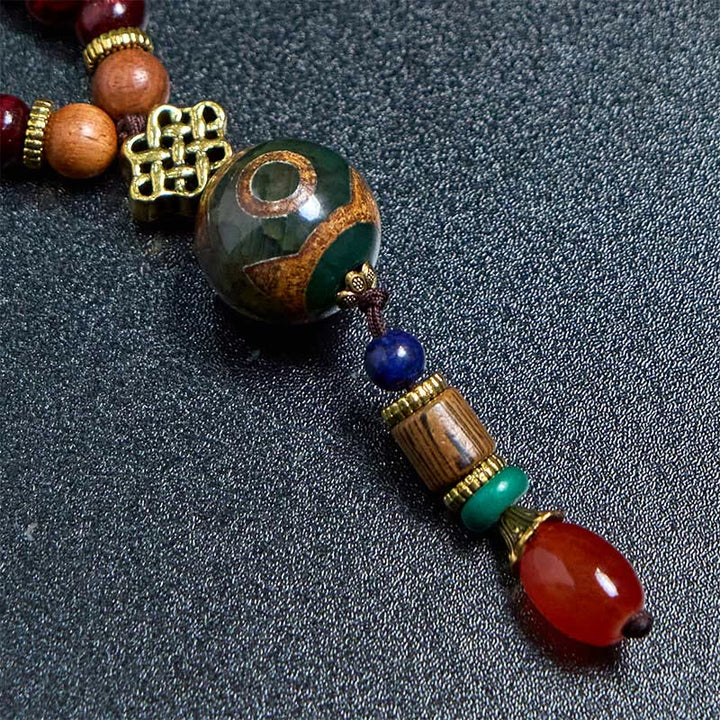 Collar con colgante de cabeza de elefante con cuentas Dzi de madera de wengué tibetana hechas a mano con Buddha Stones
