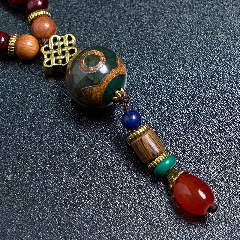 Collar con colgante de cabeza de elefante con cuentas Dzi de madera de wengué tibetana hechas a mano con Buddha Stones