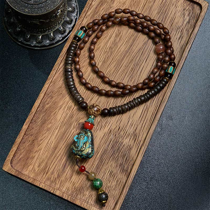 Collar con colgante de cabeza de elefante con cuentas Dzi de madera de wengué tibetana hechas a mano con Buddha Stones