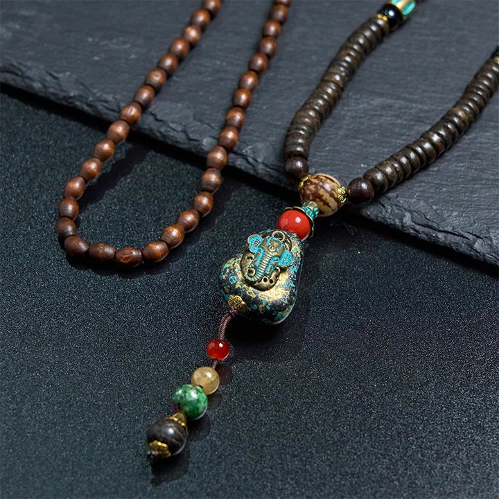 Collar con colgante de cabeza de elefante con cuentas Dzi de madera de wengué tibetana hechas a mano con Buddha Stones