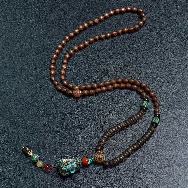 Collar con colgante de cabeza de elefante con cuentas Dzi de madera de wengué tibetana hechas a mano con Buddha Stones