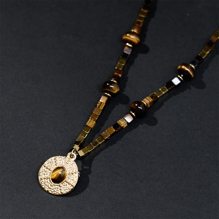 Collar con colgante de acero de titanio y Buddha Stones con protección cuadrada de ojo de tigre natural