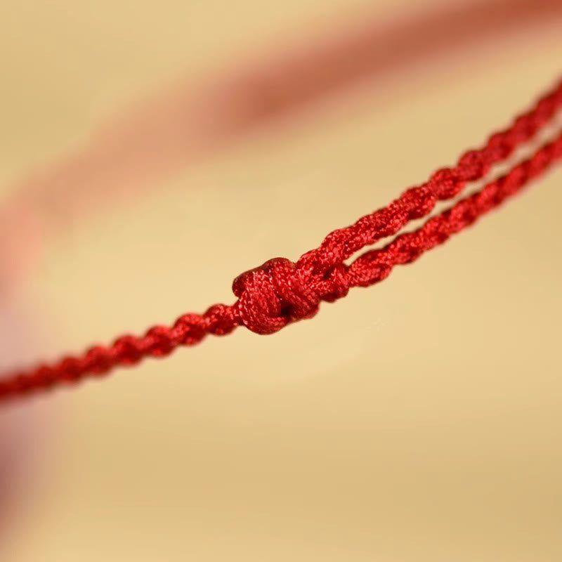 Pulsera de hilo bendecido de madera de melocotón con cuentas de cinabrio y Buddha Stones