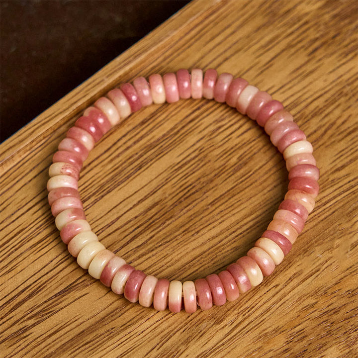 Pulsera de cuentas de sangre morada de hueso de camello tibetano natural de Buddha Stones que aleja los malos espíritus