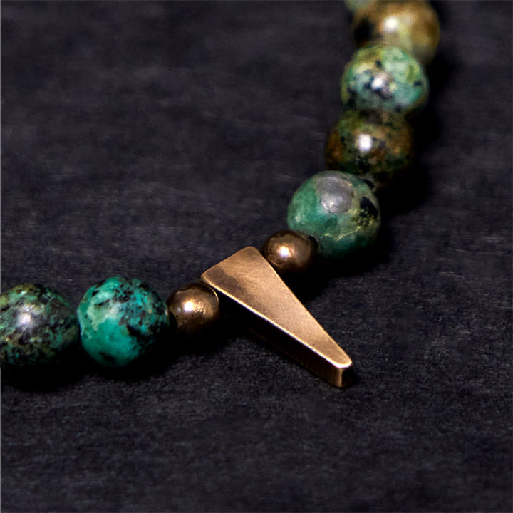 Pulsera de equilibrio de cobre turquesa con diseño desgastado vintage de Buddha Stones