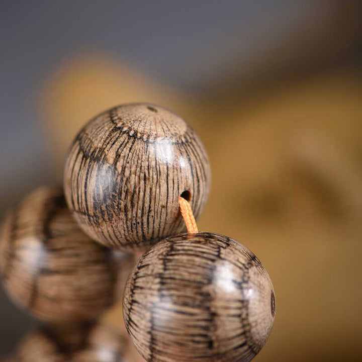 Pulsera protectora de cuentas de madera de gnetum con Buddha Stones - image 11