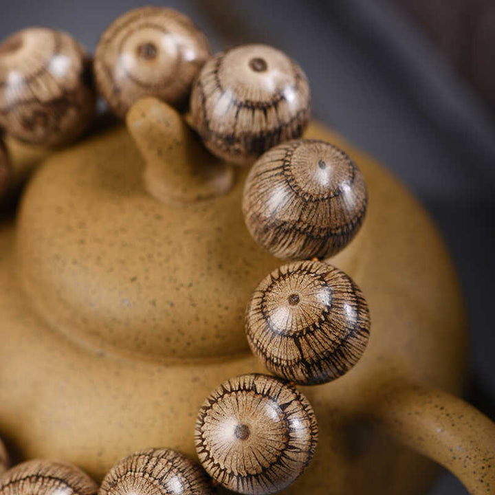 Pulsera protectora de cuentas de madera de gnetum con Buddha Stones - image 3