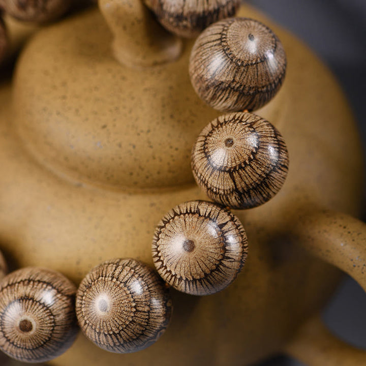 Pulsera protectora de cuentas de madera de gnetum con Buddha Stones - image 4
